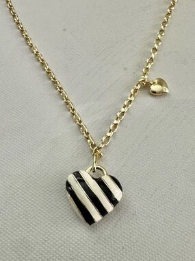 Gold Heart Pendant Necklace with Black and White Striped Heart Charm